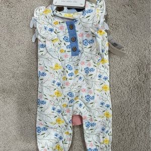Catherine:  Three piece set- jumpsuit, short sleeve onesie and matching bow.